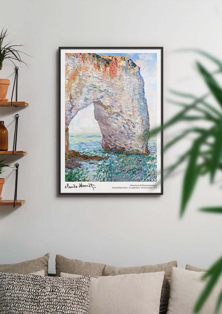Claude Monet exhibition poster showing his artwork 'The Manneporte near Étretat' from 1883.
